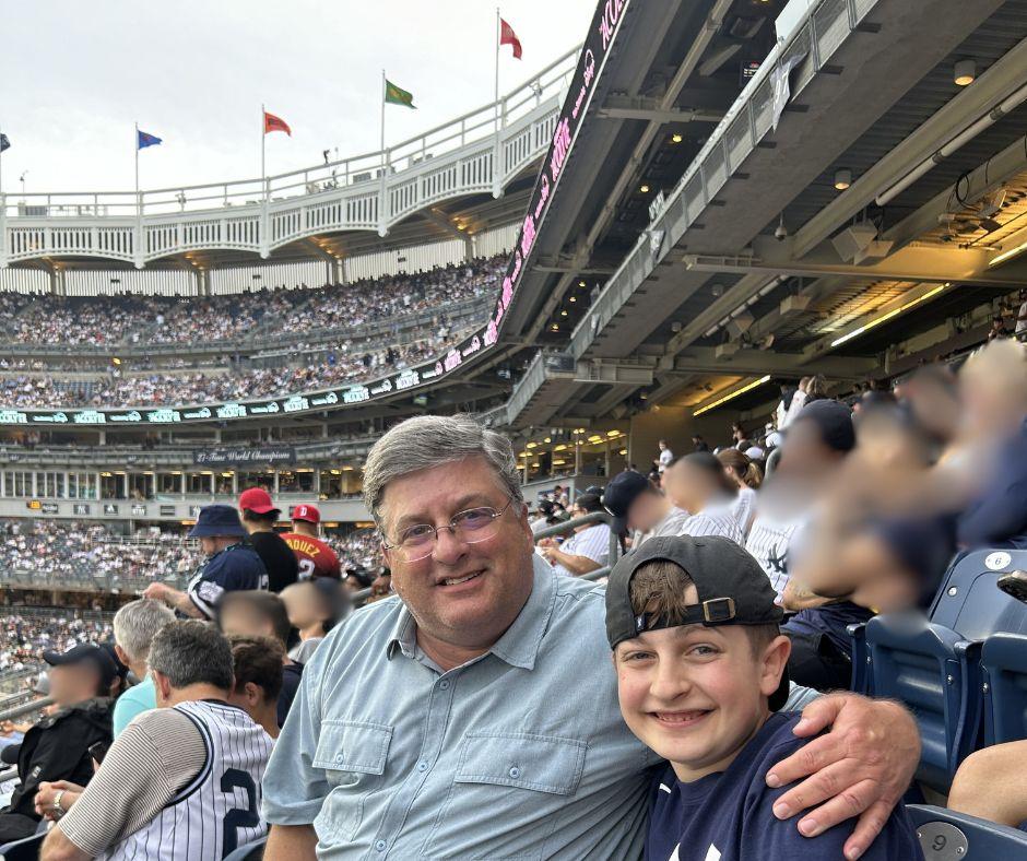 Paul and son at Yankee Stadium