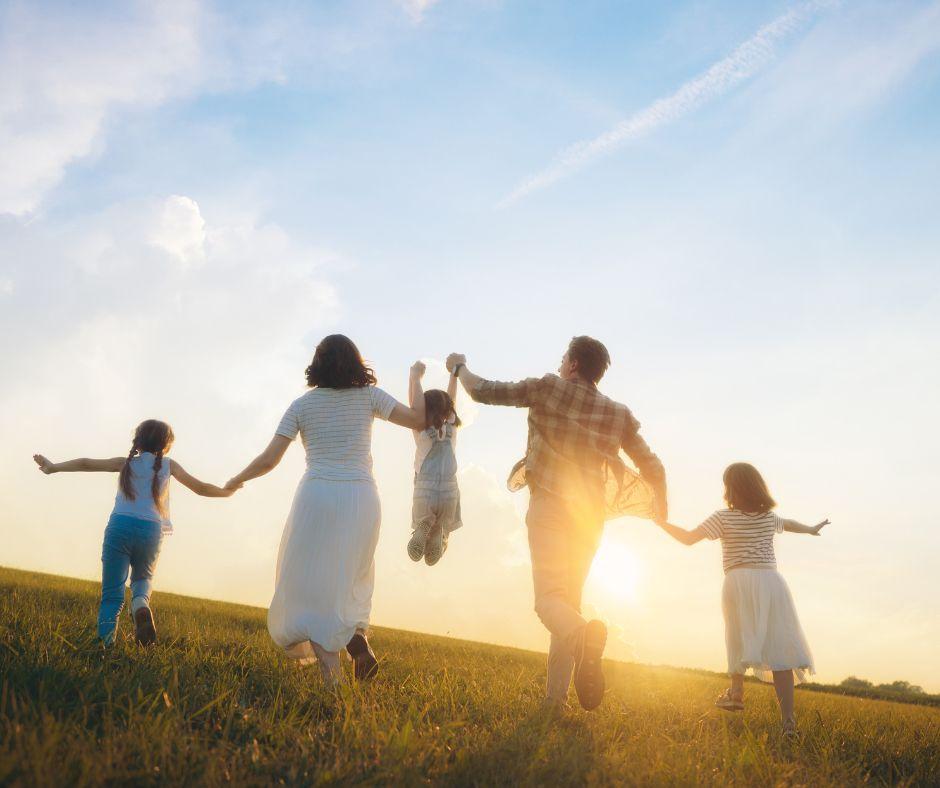 Family walking in the son